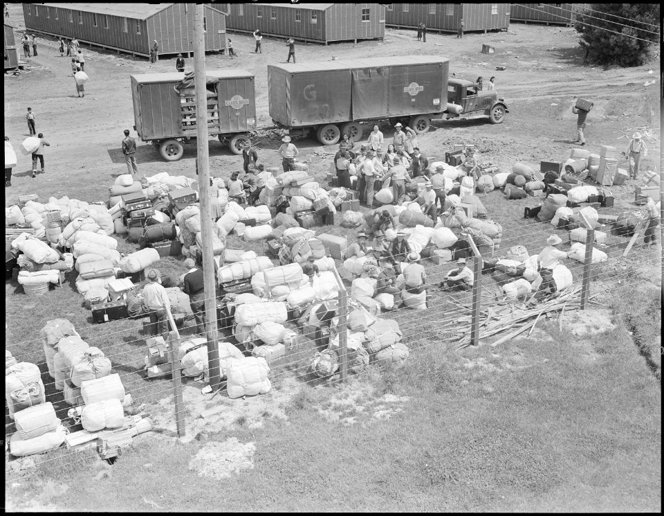 Salinas, California. This baggage belonging to evacuees of Japanese ancestry was brought in by truc . . . - NARA - 536160
