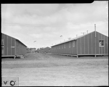 Salinas, California. Looking between two rows of Barracks at the Salinas Assembly center. - NARA - 536179