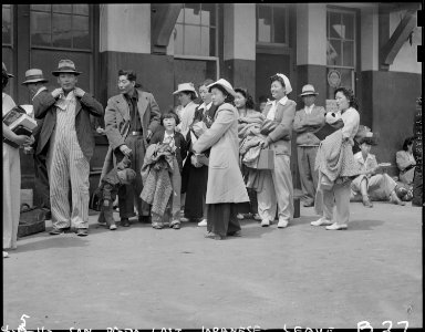 San Pedro, California. Evacuated residents of Japanese ancestry await transportation to assembly ce . . . - NARA - 536776 photo
