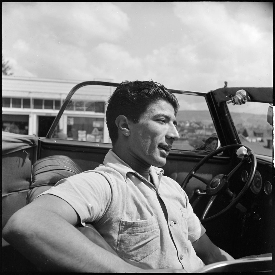 Roosevelt High School, Oakland, California. High School Youth. The speed burner owner of a cut-down, souped-up car... - NARA - 532222