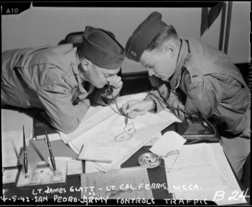 San Pedro, California. Lieutentant James Glatt, (left), and Lieutenant Cal Ferris, (right), complet . . . - NARA - 536773 photo