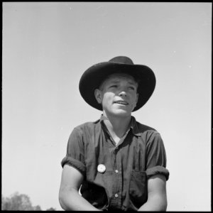 San Joaquin Valley, California. Contract Labor. Sixteen years old and the possessor of a labor contractor's button... - NARA - 532165 photo