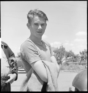 San Leandro, California. Youth on Relief. Waiting in line for surplus commodities - NARA - 532132 photo