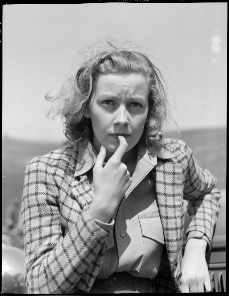 Santa Clara County, California. Motorcycle and Hill Climb Recreation. An apprehensive onlooker. This woman is a... - NARA - 532254