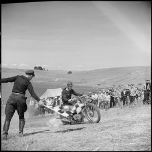 Santa Clara County, California. Motorcycle and Hill Climb Recreation. Breaking the starting tape - NARA - 532253 photo