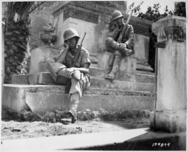 Sergeant Norwood Dorman, Benson, North Carolina, stops to rest at the memorial to the Italian soldier of World War I.... - NARA - 531164