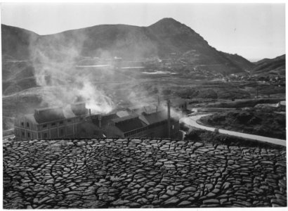 Sardinia, Italy. The steam rising from the stacks comes from the Monteponi mine. Sardinian mines contribute a major... - NARA - 541728 photo