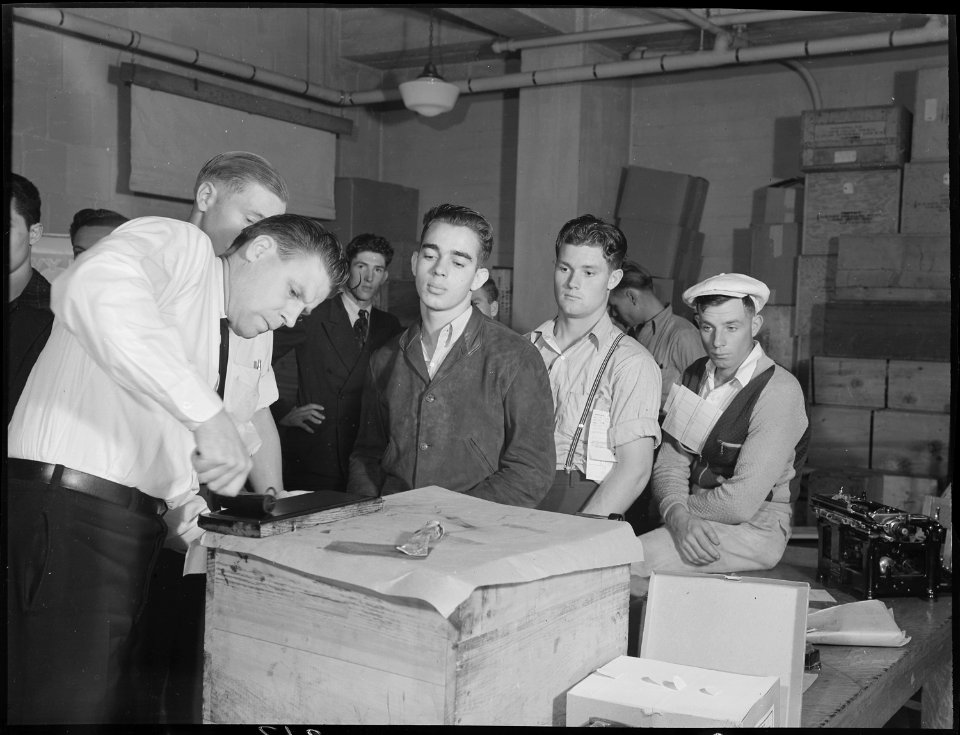 San Francisco, California. Hanging Around. Shipping Day in a Navy enlistment office. These boys are being finger... - NARA - 532263