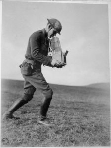 Second Lieutenant Paul Weir Cloud, still operator, photographic unit with 89th Division. Near Kyllburg, Germany.... - NARA - 530790