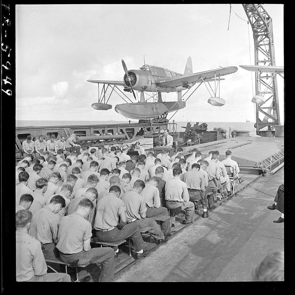 Sunday services, conducted by Lt. James W. Kelly (CHC) on board the USS Mobile (CL-63) enroute for raid on Marcus... - NARA - 520886