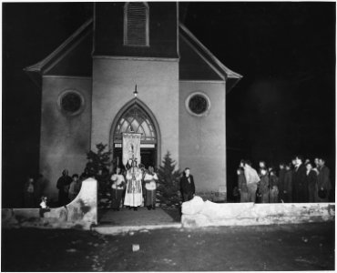 Taos County, New Mexico. Fiesta of Guadalipe, Taos. Following vespers, congregation leaves church, . . . - NARA - 521953