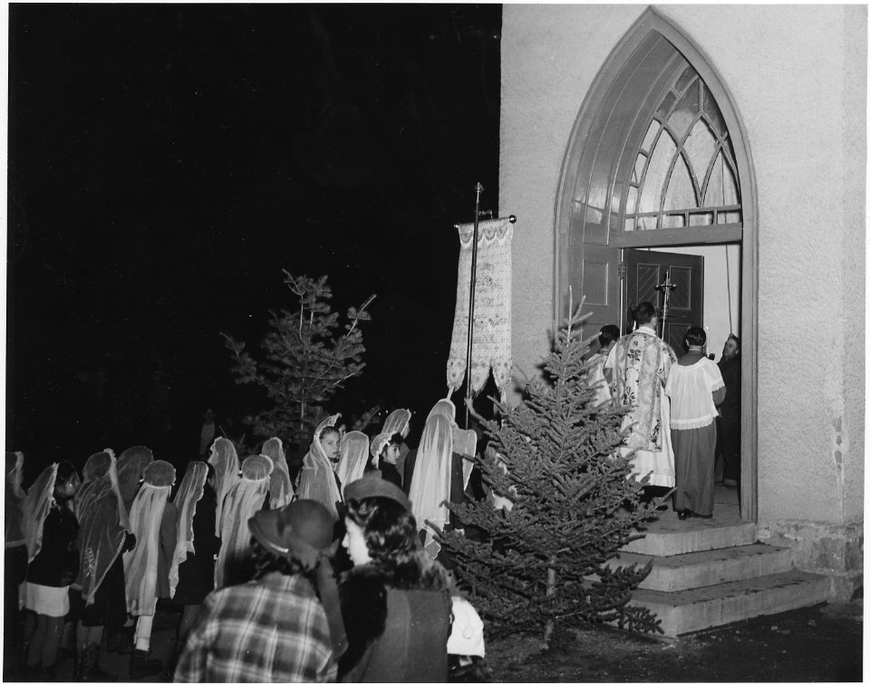 Taos County, New Mexico. Fiesta of Guadalipe, Taos. Following vespers, congregation leaves church, . . . - NARA - 521957