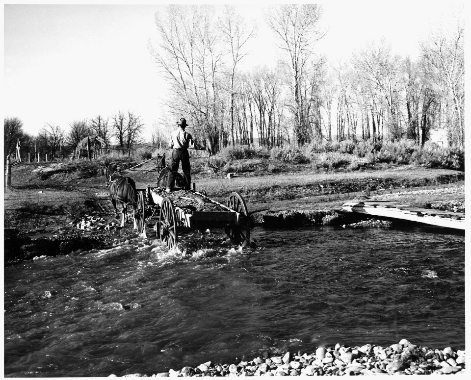 Taos County, New Mexico. Gravel from the river bed will be used to make the area immediately surrou . . . - NARA - 521820