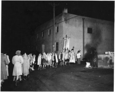 Taos County, New Mexico. Fiesta of Guadalipe, Taos. Following vespers, congregation leaves church, . . . - NARA - 521954