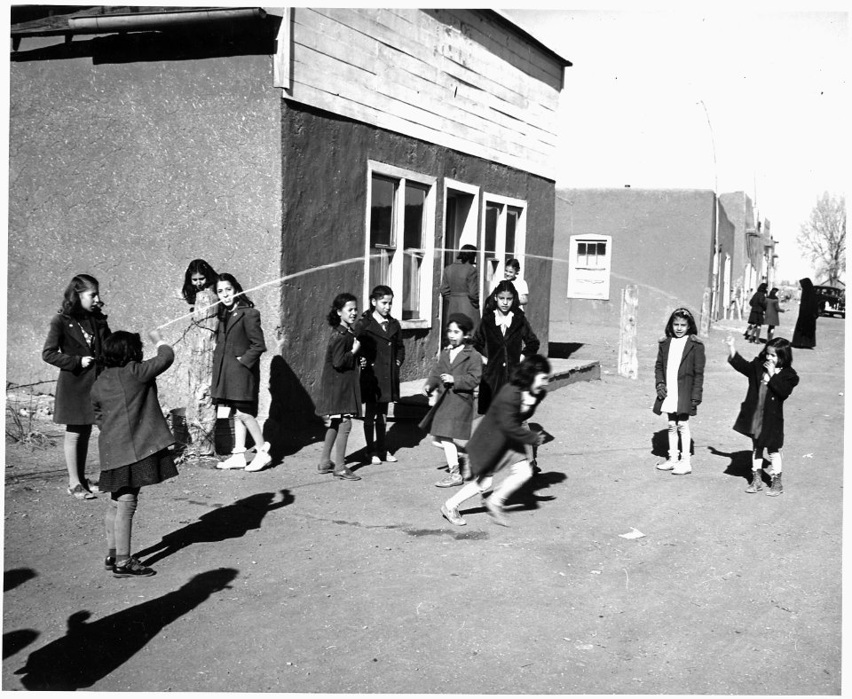 Taos County, New Mexico. Children play during noon hour at Costilla. - NARA - 521984