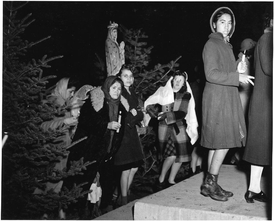 Taos County, New Mexico. Fiesta of Guadalipe, Taos. Following vespers, congregation leaves church, . . . - NARA - 521958