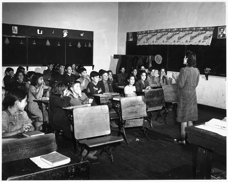 Taos County, New Mexico. Note apparent overcrowding in this schoolroom at Canyon. About half of th . . . - NARA - 521845