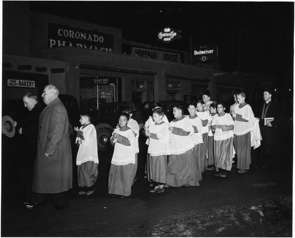 Taos County, New Mexico. Fiesta of Guadalipe, Taos. Following vespers, congregation leaves church, . . . - NARA - 521956