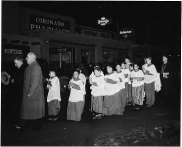 Taos County, New Mexico. Fiesta of Guadalipe, Taos. Following vespers, congregation leaves church, . . . - NARA - 521956