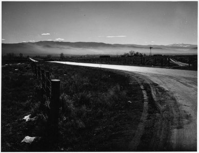 Taos County, New Mexico. Mist in Taos Valley in the morning. Highway into Taos village from the no . . - NARA - 521816
