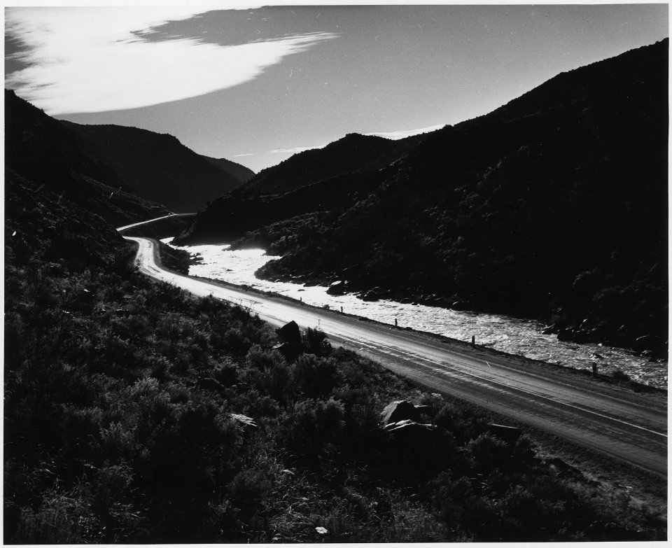 Taos County, New Mexico. Road to Taos from Santa Fe follows river through the mountains between the . . . - NARA - 522007