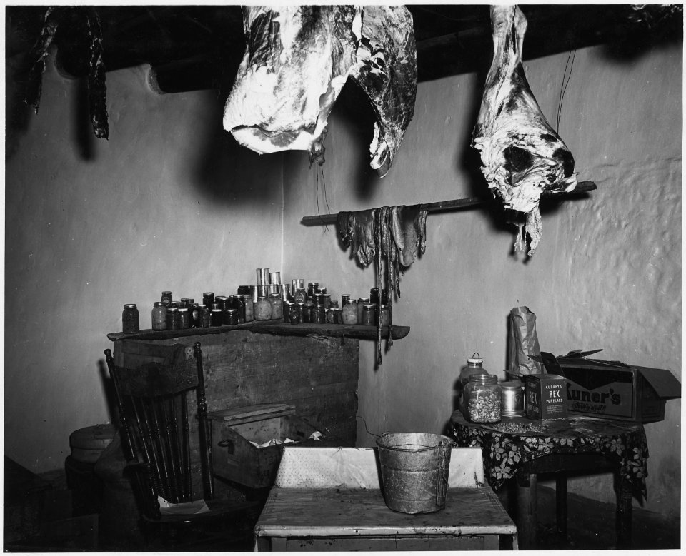 Taos County, New Mexico. Storage room at the Pablo Gomez place. Here are stored raw fat and meats, . . . - NARA - 521912