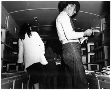 Taos County, New Mexico. Taos County project bookmobile visits Llano San Juan, circulates books, sh . . . - NARA - 521856