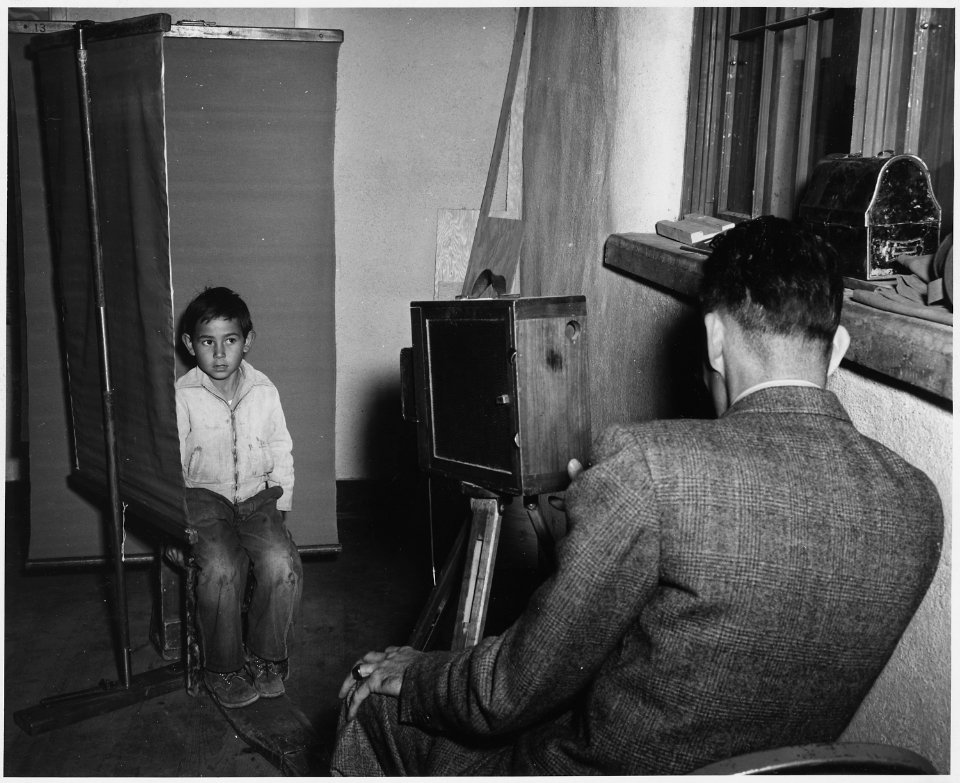 Taos County, New Mexico. Teachers cooperate with itinerant photographer at Questa school. Photogra . . . - NARA - 521871