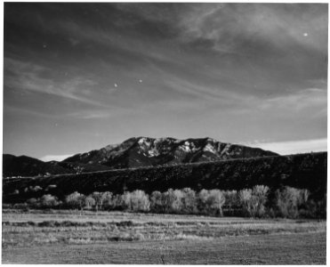 Taos County, New Mexico. Aspens in Valdez Valley, looking toward the Sange de Cristo Mountains. Ho . . . - NARA - 521823 photo