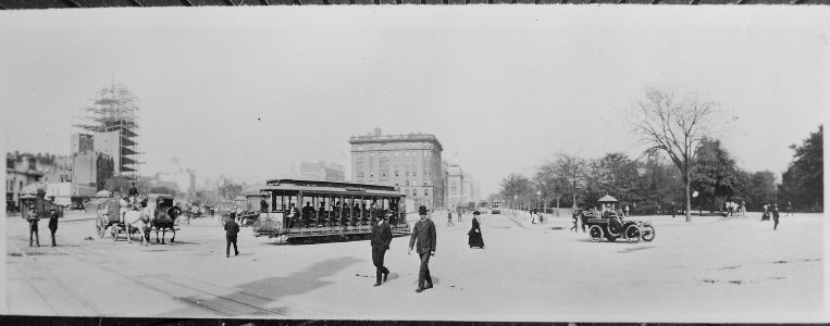 The Eighth Avenue trolley, New York City, sharing the street with horse-drawn produce wagon and an open automobile. Down - NARA - 541891
