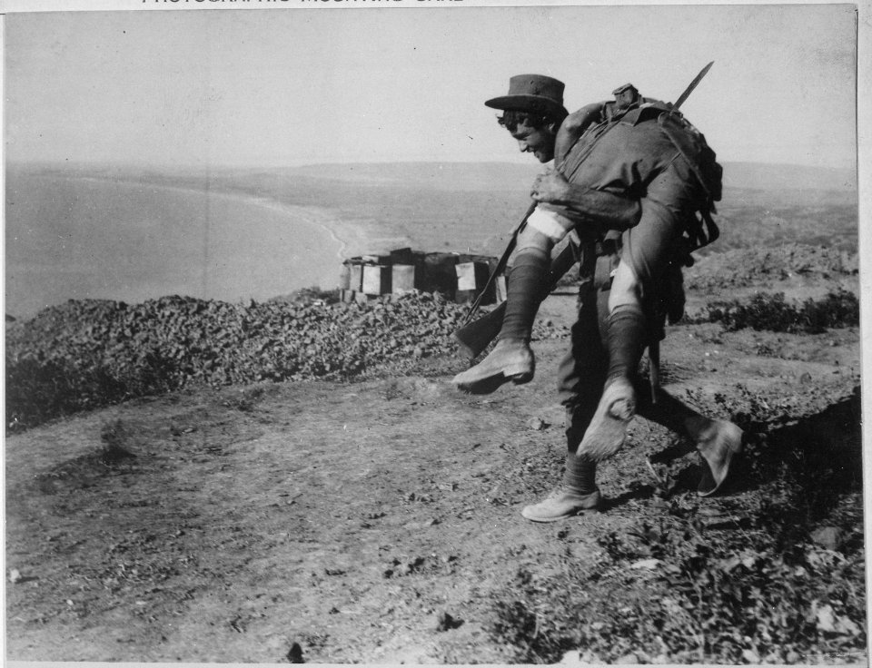 The irrepressible Australians at Anzac. An Australian bringing in a wounded comrade to hospital. Dardanelles... - NARA - 533106