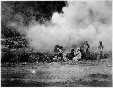 The Rockets Red Glare-U.S. Marines launch a 4.5 rocket barrage against the Chinese Communists in the Korean fighting. - NARA - 532422