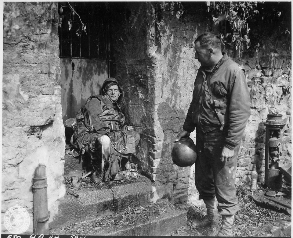 This dead German soldier was one of the last stand defenders of German-held Cherbourg. Captain Earl Topley, who led... - NARA - 531214