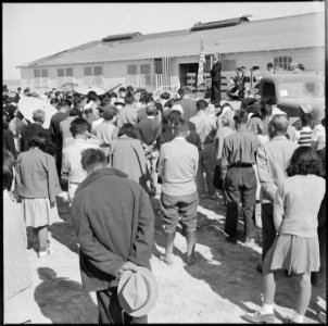 Topaz, Utah. An evacuee resident, who is a Christian minister, opens the hospital dedication with a . . . - NARA - 538724