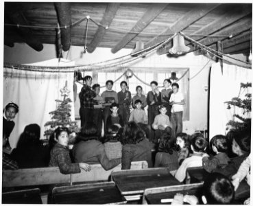 Taos County, New Mexico. Pupils of the Prado school rehearse their Christmas play. - NARA - 521990 photo