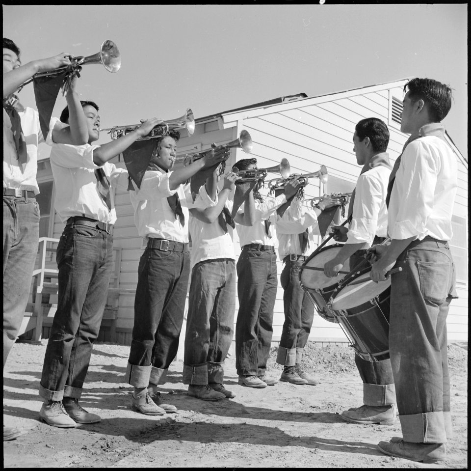 Topaz, Utah. A section of the drum and the bugle corps, a former boy scout unit, performs at the de . . . - NARA - 538723