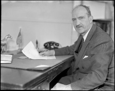 Topaz, Utah. Charles E. Ernst, Project Director, at his desk in the Administrative building at the . . . - NARA - 538670