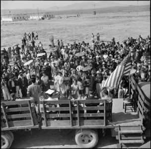 Topaz, Utah. A young doctor of Japanese parentage, addresses the gathered crowd at dedication ceremo . . . - NARA - 538695