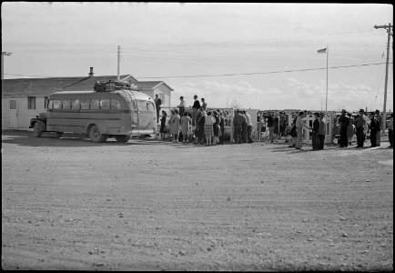 Topaz, Utah. Evacuees and appointed personnel bidding each other goodbye for the last time as the l . . . - NARA - 539620