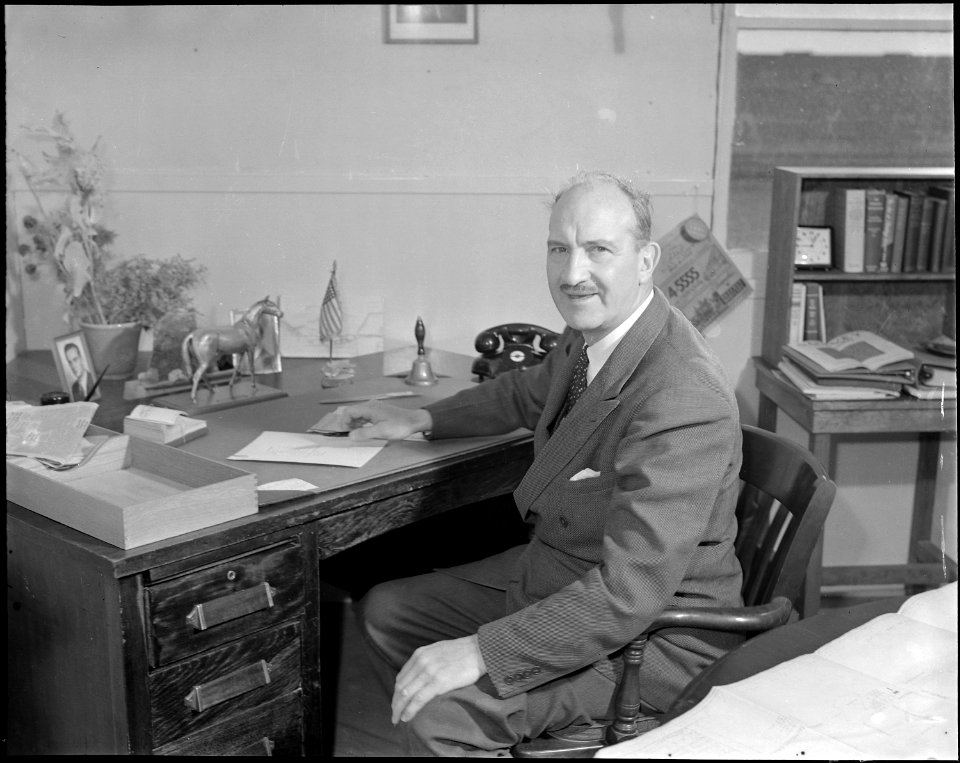 Topaz, Utah. Charles F. Ernst, Project Director, at his desk in the Administration building at the . . . - NARA - 538672