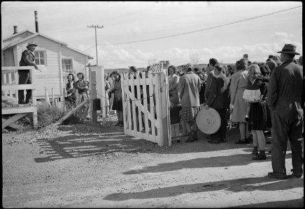 Topaz, Utah. Luther E. Hoffman, Project Director at he Central Utah Relocation Center, is shown spe . . . - NARA - 539619