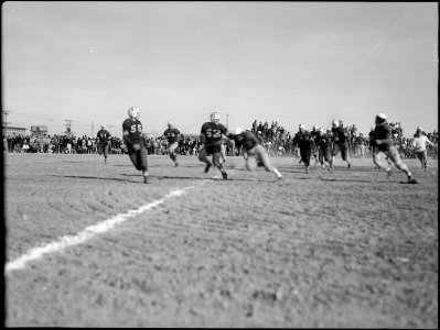 Topaz, Utah. Over the line for a touchdown in football game between Topaz and Fillmore high schools . . . - NARA - 539514