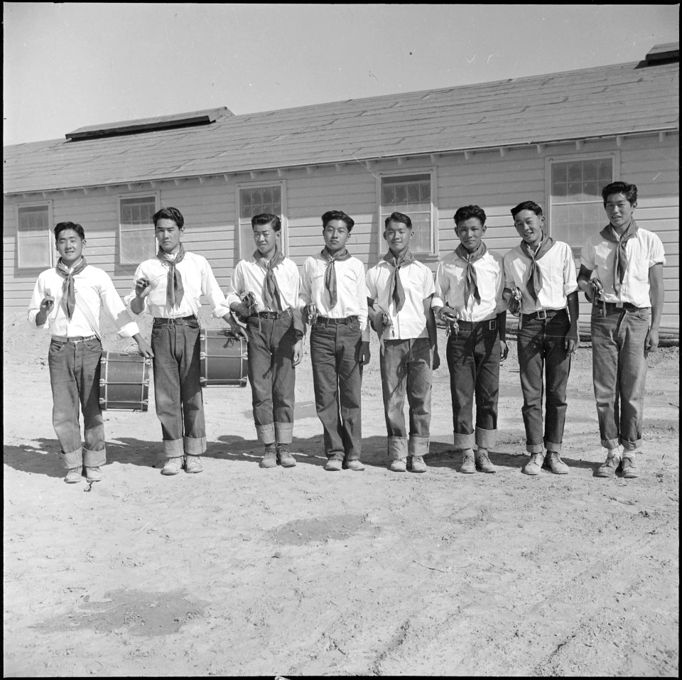 Topaz, Utah. Members of the drum and bugle corp, formerly a boy scout troop at Los Angeles, pose fo . . . - NARA - 538693