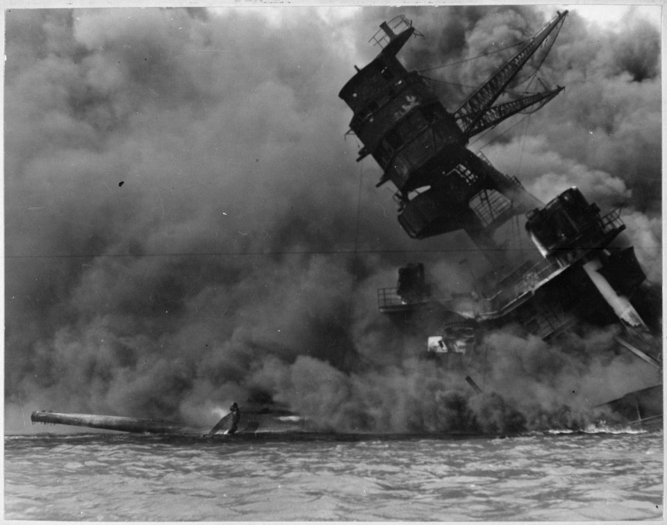 The USS ARIZONA burning after the Japanese attack on Pearl Harbor. - NARA - 520601