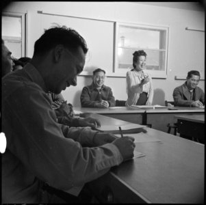Topaz, Utah.. The only woman member of the Community Council, is shown arguing her point at a ameet . . . - NARA - 536991
