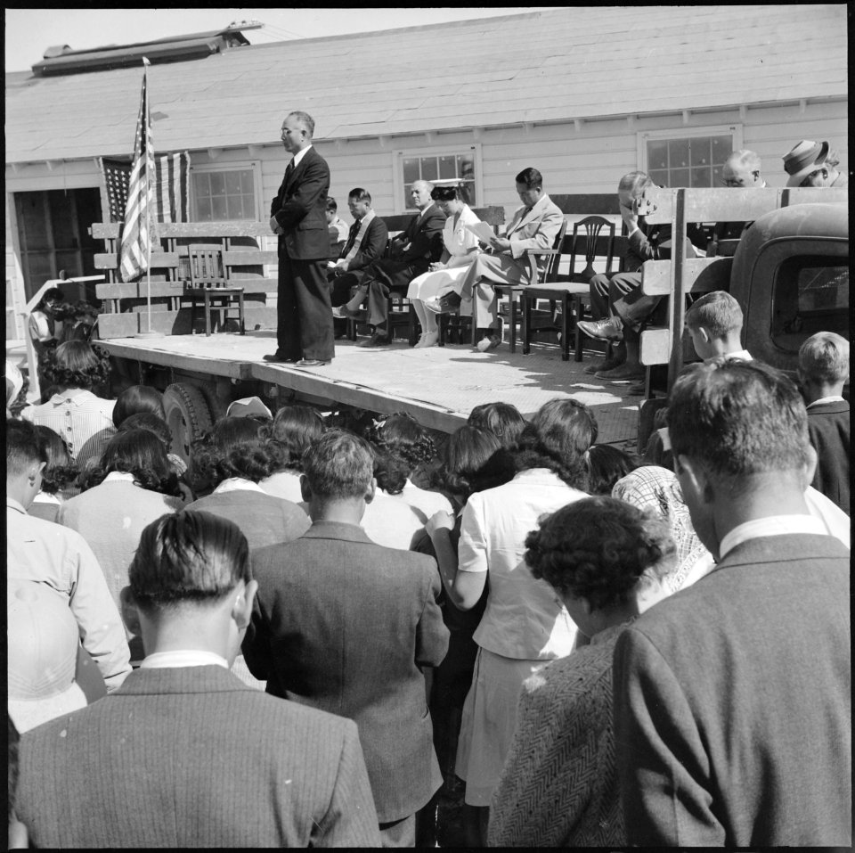 Topaz, Utah. With a fervent prayer, this Japanese Topaz resident, a Christian Minister, opens the d . . . - NARA - 538708