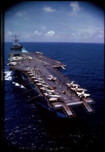 The nuclear powered aircraft carrier USS Enterprise (CVAN-65) cruises in the clear blue water of the Gulf of Tonkin... - NARA - 558507