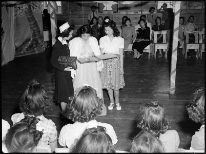 Tule Lake Relocation Center, Newell, California. A fashion show was one of the many exhibits held a . . . - NARA - 538408