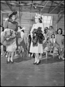 Tule Lake Relocation Center, Newell, California. A fashion show was one of the many exhibits held a . . . - NARA - 538398