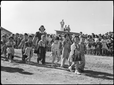 Tule Lake Relocation Center, Newell, California. A parade was held by evacuees to celebrate labor d . . . - NARA - 538427